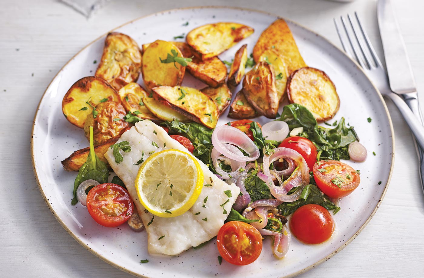 Peixe no forno com batata e cebola